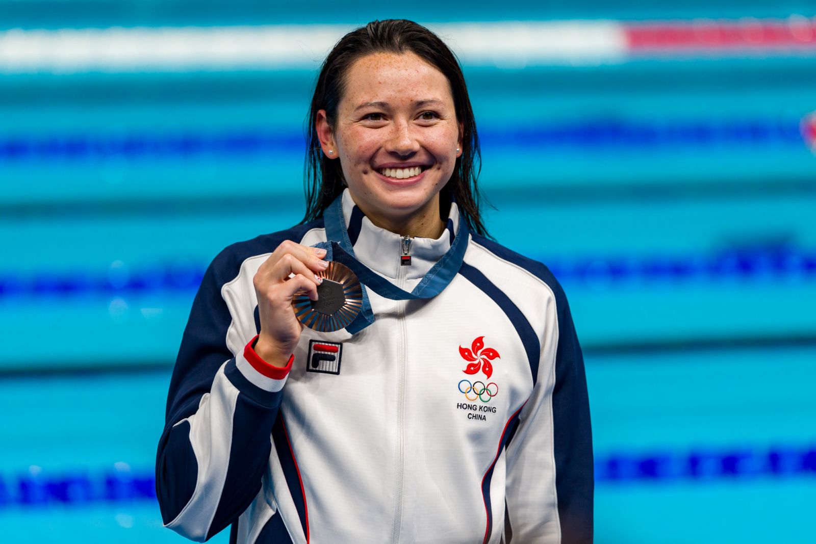 NANTERRE, FRANCE - JULY 31: Bronze Medalist Siobhan Bernadette Haughey of Team Hong Kong poses for a photo during the Swimming medal ceremony after the Women's 100m Freestyle Final on day five of the Olympic Games Paris 2024 at Paris La Defense Arena on July 31, 2024 in Nanterre, France. (Photo by Andy Cheung/Getty Images)