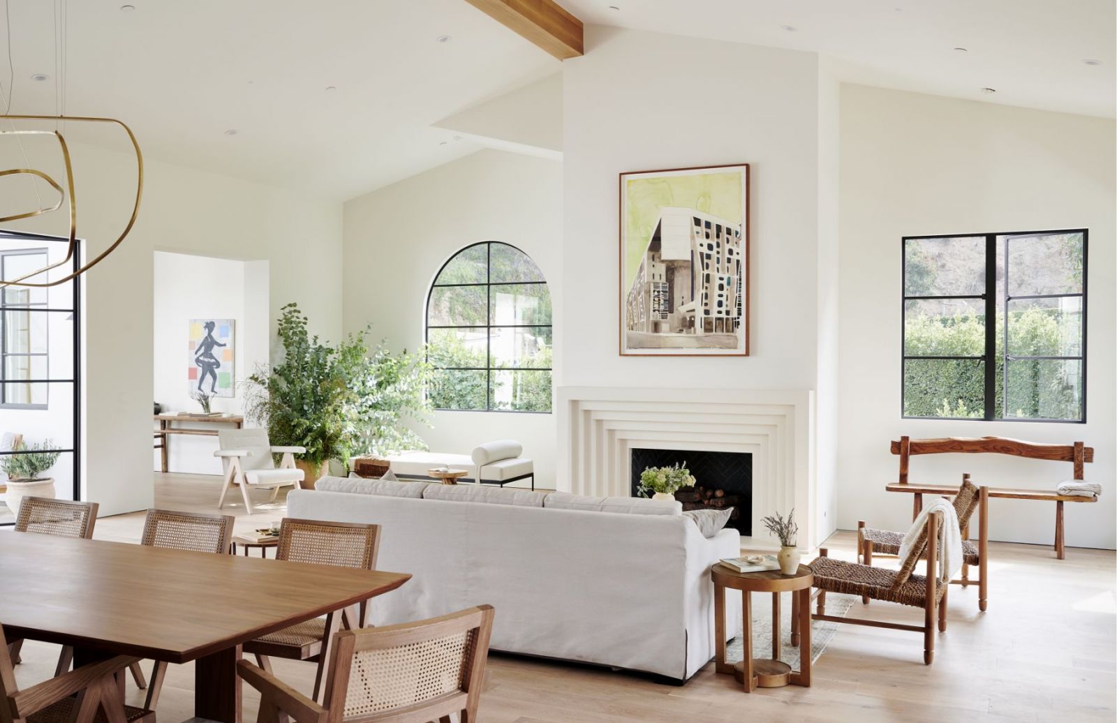 White oak floors, oak accents and cream walls in the open-plan home (Photo: Amy Neunsinger)