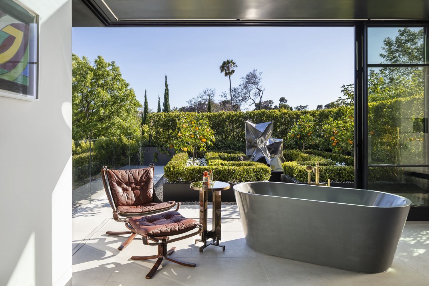 The master bathroom opens into the landscaped garden (Photo: Manolo Langis)