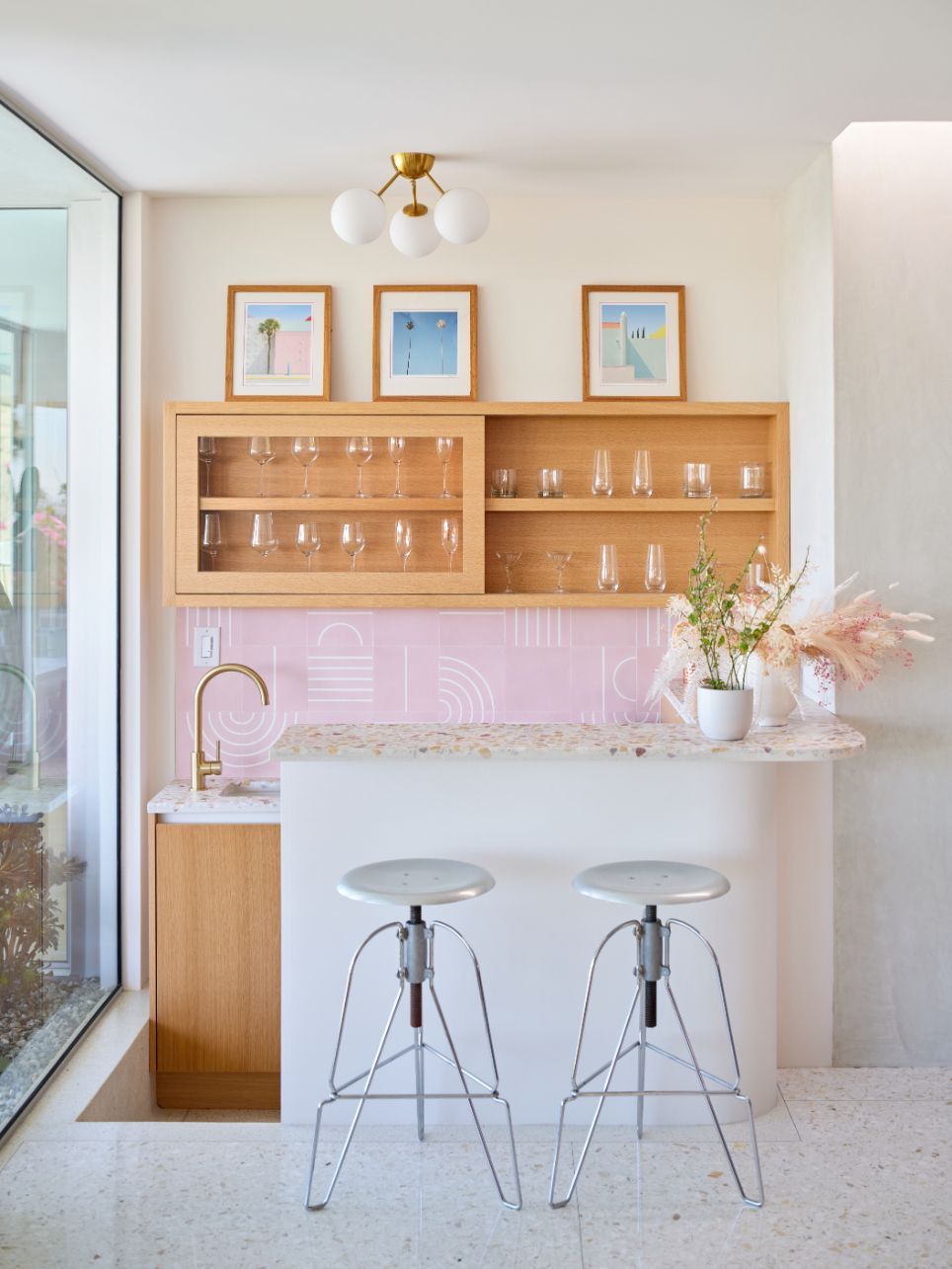 A bespoke pastel pink terrazzo backsplash at the wet bar (Photo: Brandon Shigeta)