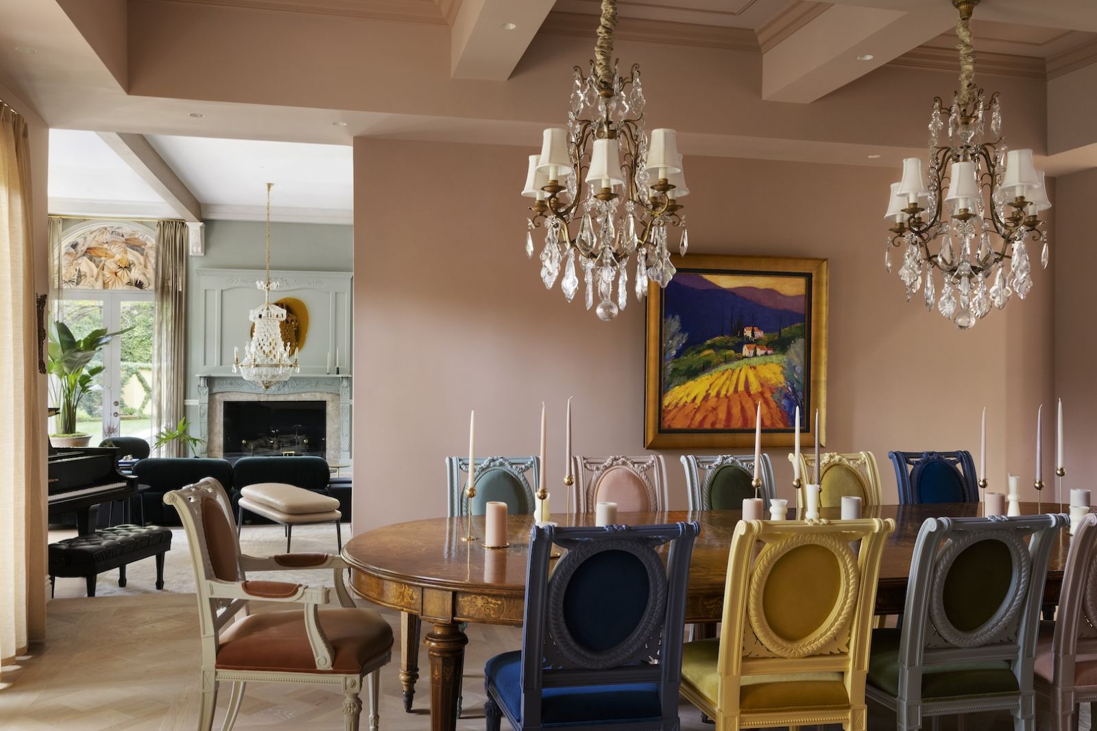 Playful multi-coloured upholstered chairs in the dining area (Photo: Ema Peter Photography)