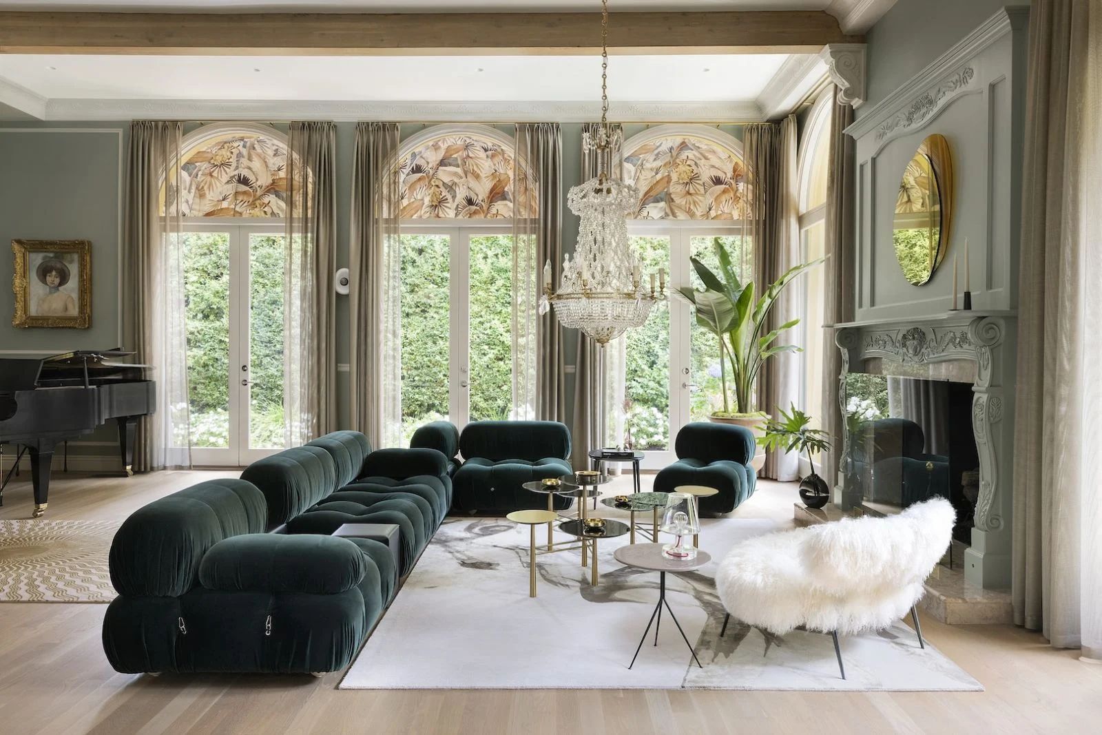 Green hues in the living room converse with the verdant backyard outside (Photo: Ema Peter Photography)