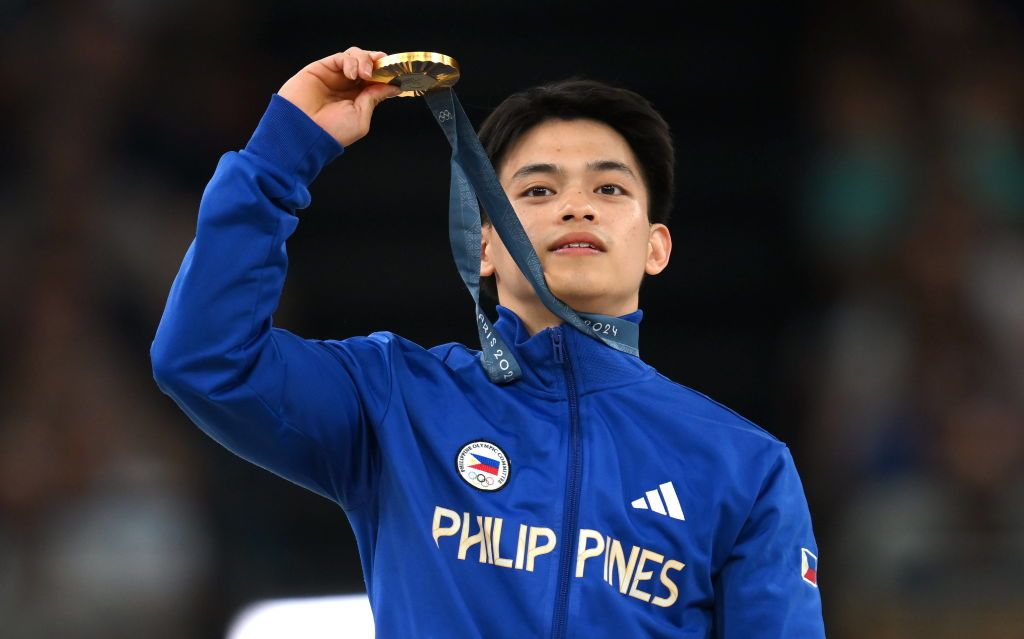 Carlos Edriel Yulo of Team Philippines with his gold medal after the Men's Floor Exercise Final at the Gymnastics Bercy Arena (Photo By Stephen McCarthy / Sportsfile via Getty Images)