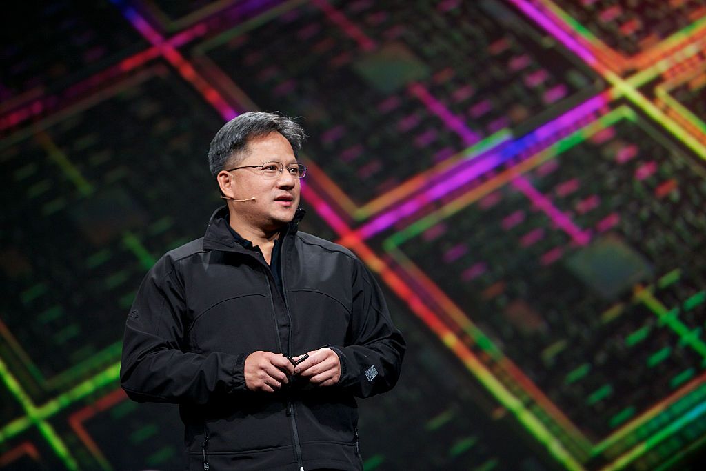 Nvidia Chief Executive Jen-Hsun Huang, intoduces new graphics processing products and advances based on their Kepler GPU computing architecture technology. Huang demonstrated how GPU's operating in cloud servers can now be used to work, play games or render video, during his keynote at the GPU Technology Conference in San Jose, California. (Photo by Kim Kulish/Corbis via Getty Images)