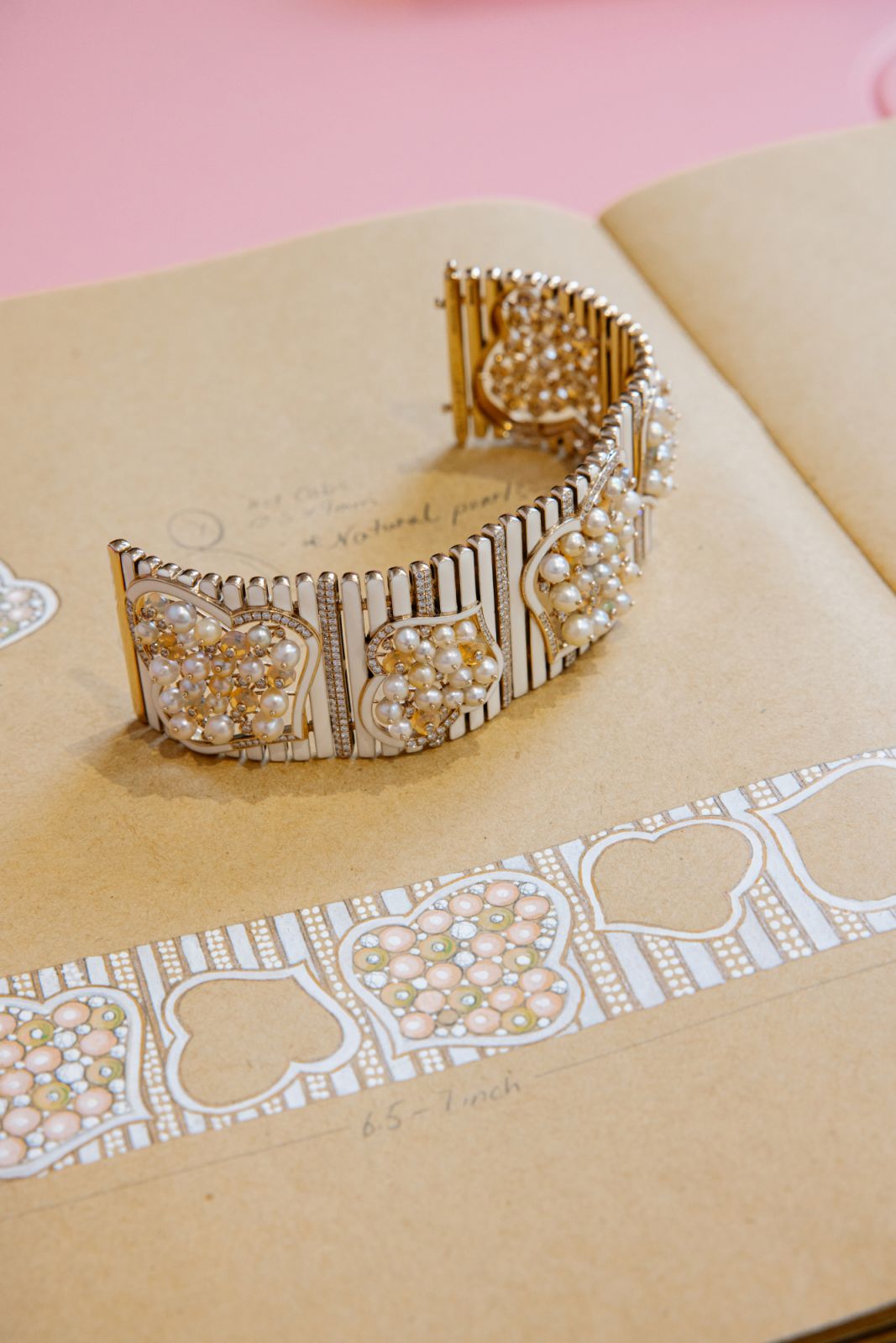 The Selene cuff with natural pearls on design sketches (Photo: Philip Andrukhovich)