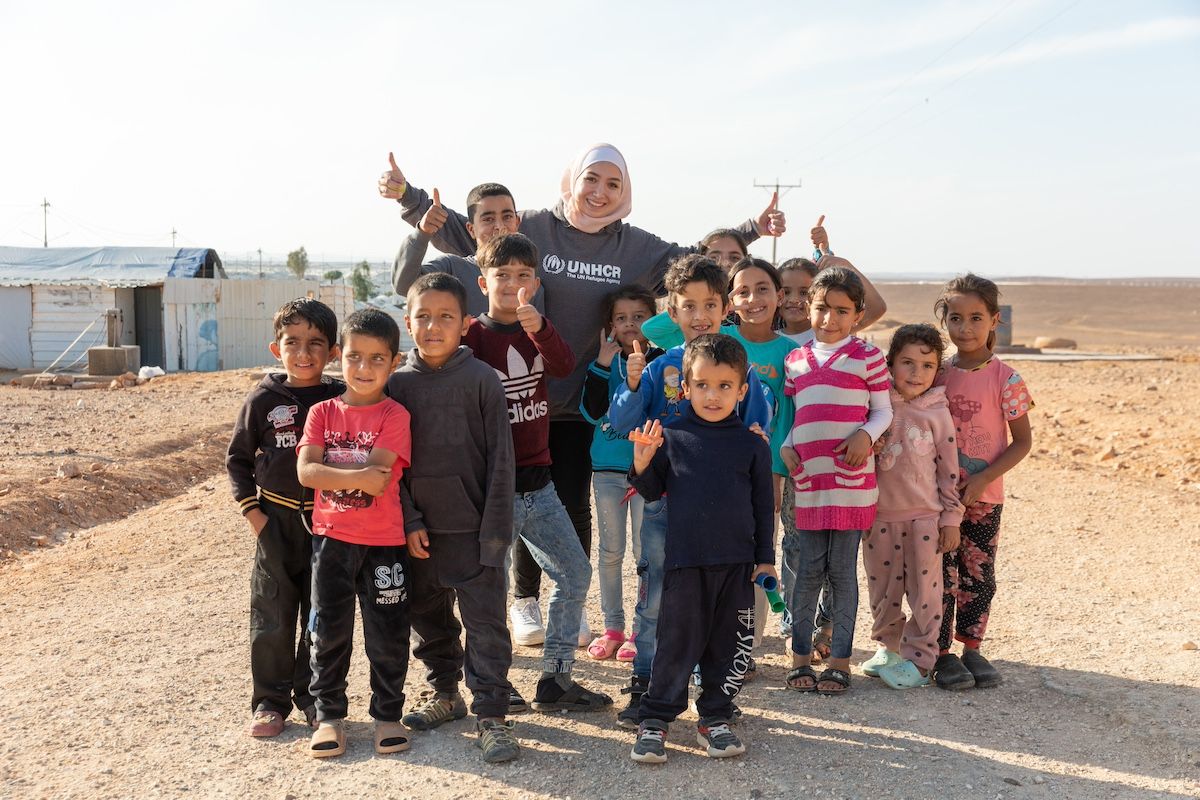 Goodwill Ambassador Maya Ghazal in Azraq camp for Syrian refugees. Maya Ghazal is a UK-based Syrian refugee, the first female Syrian pilot, and a Diana Award winner. Image: UNHCR/Jordi Matas