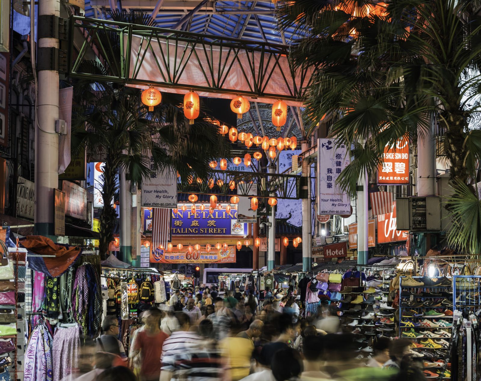 Malaysia, Kuala Lumpur, Chinatown night market, busy with shoppers.