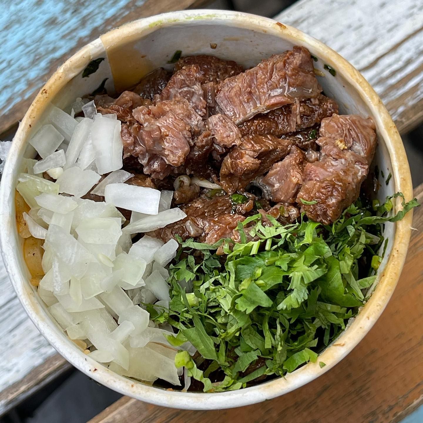 Cholos - Pork birria served with noodles