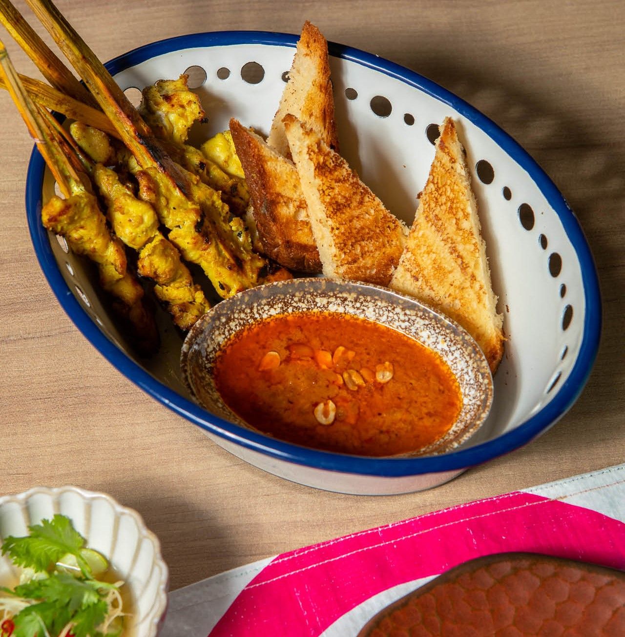 Err - Chicken satay with cucumber relish, peanut sauce and toasted brioche