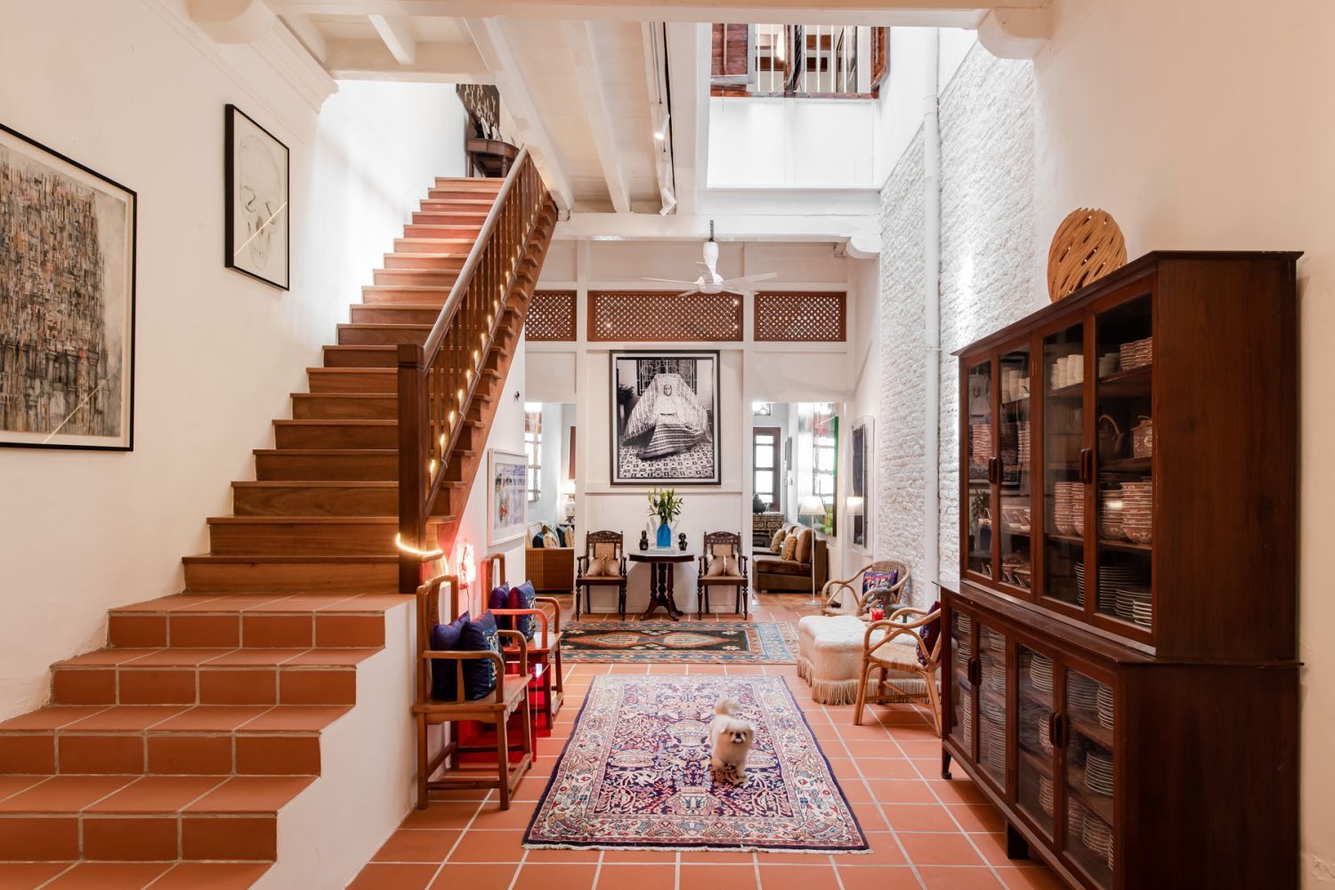 Natural light streams into the long shophouse courtesy of a skylight