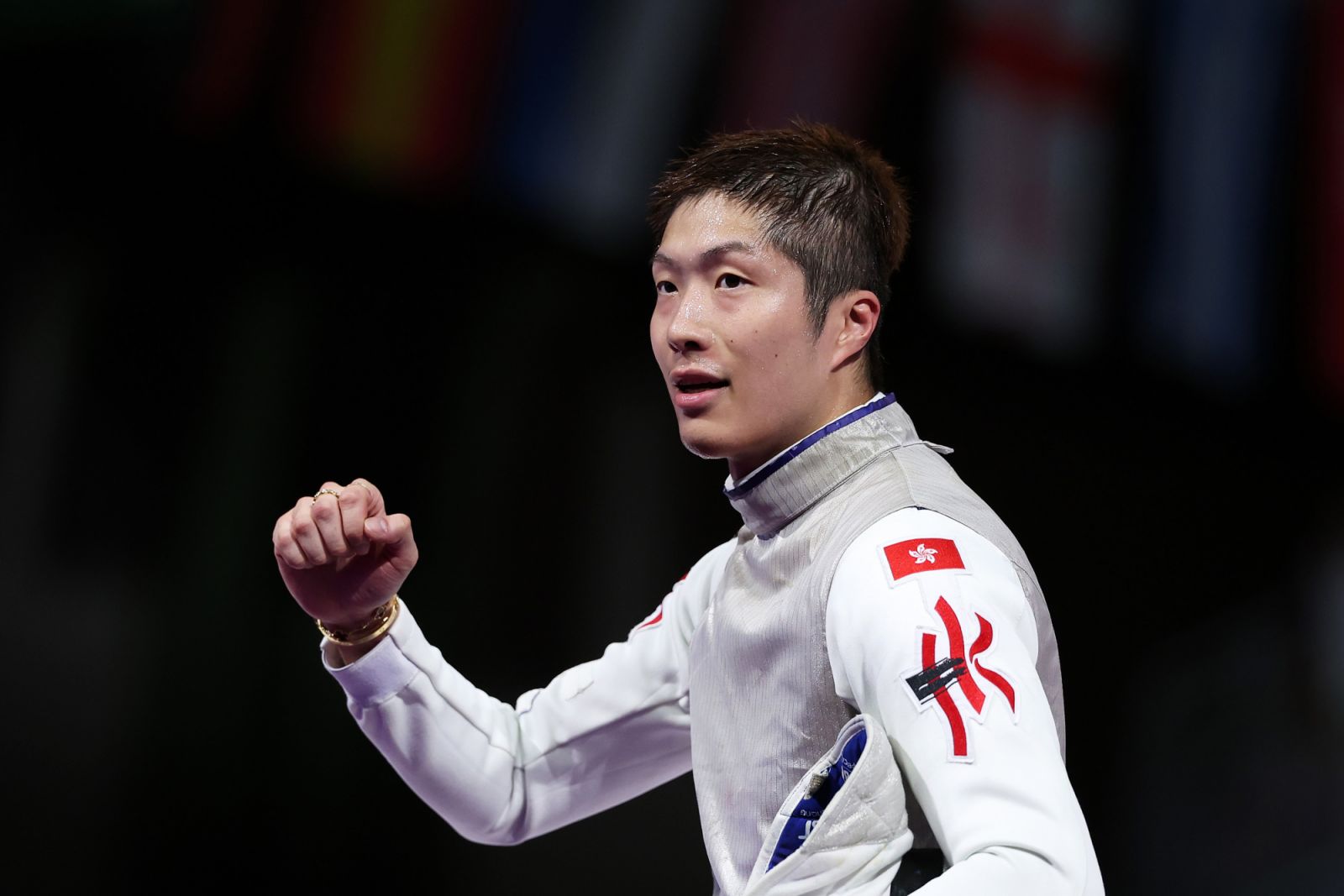 PARIS, FRANCE - JULY 29: Ka Long Cheung of team Hong Kong celebrates after winning the Fencing Men's Foil Individual Semifinal 1 the Fencing Men's Foil Individual Semifinal 1 on day three of the Olympic Games Paris 2024 at Grand Palais on July 29, 2024 in Paris, France. (Photo by Al Bello/Getty Images)