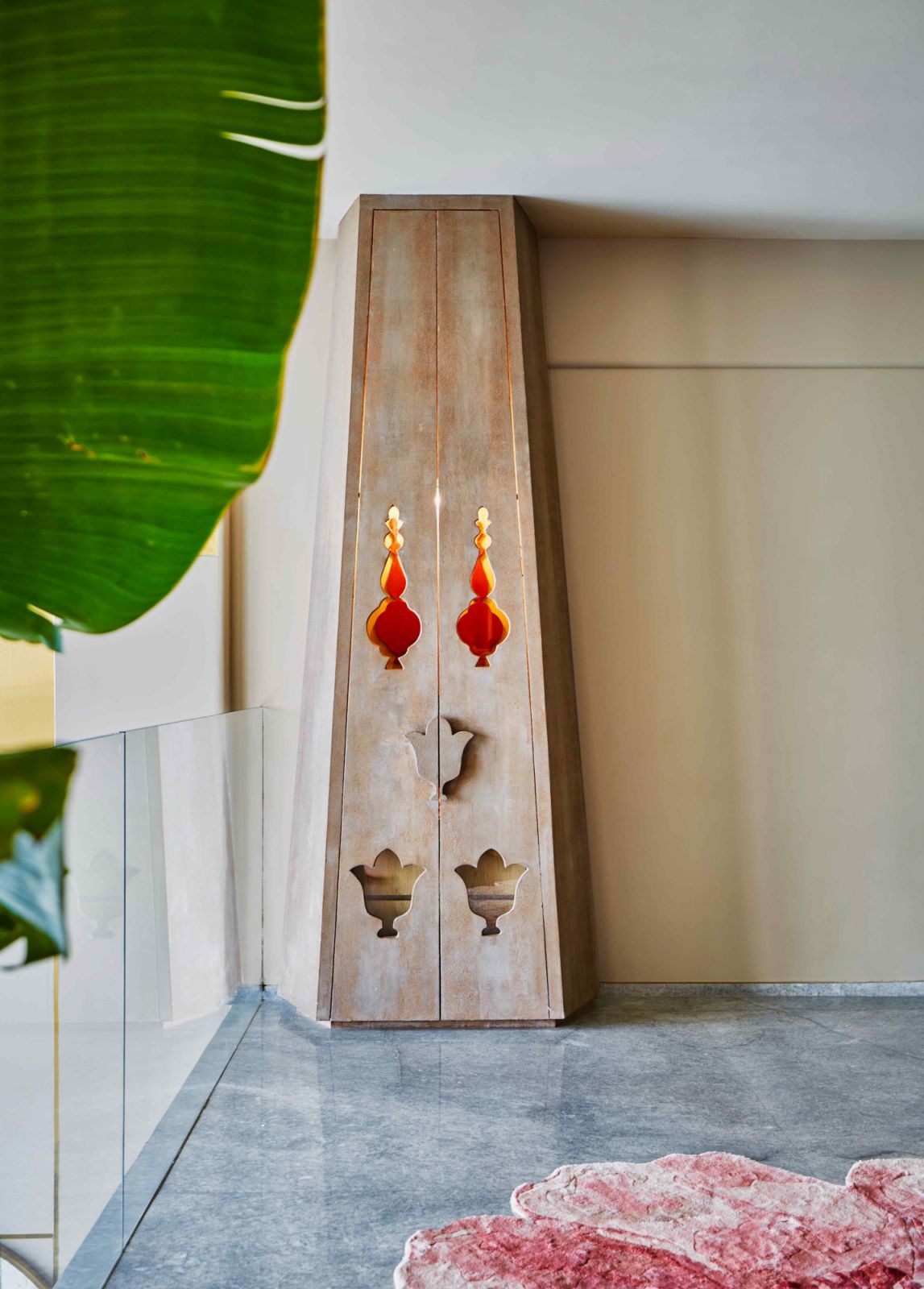 A small mandir tucked away behind foldable shutters