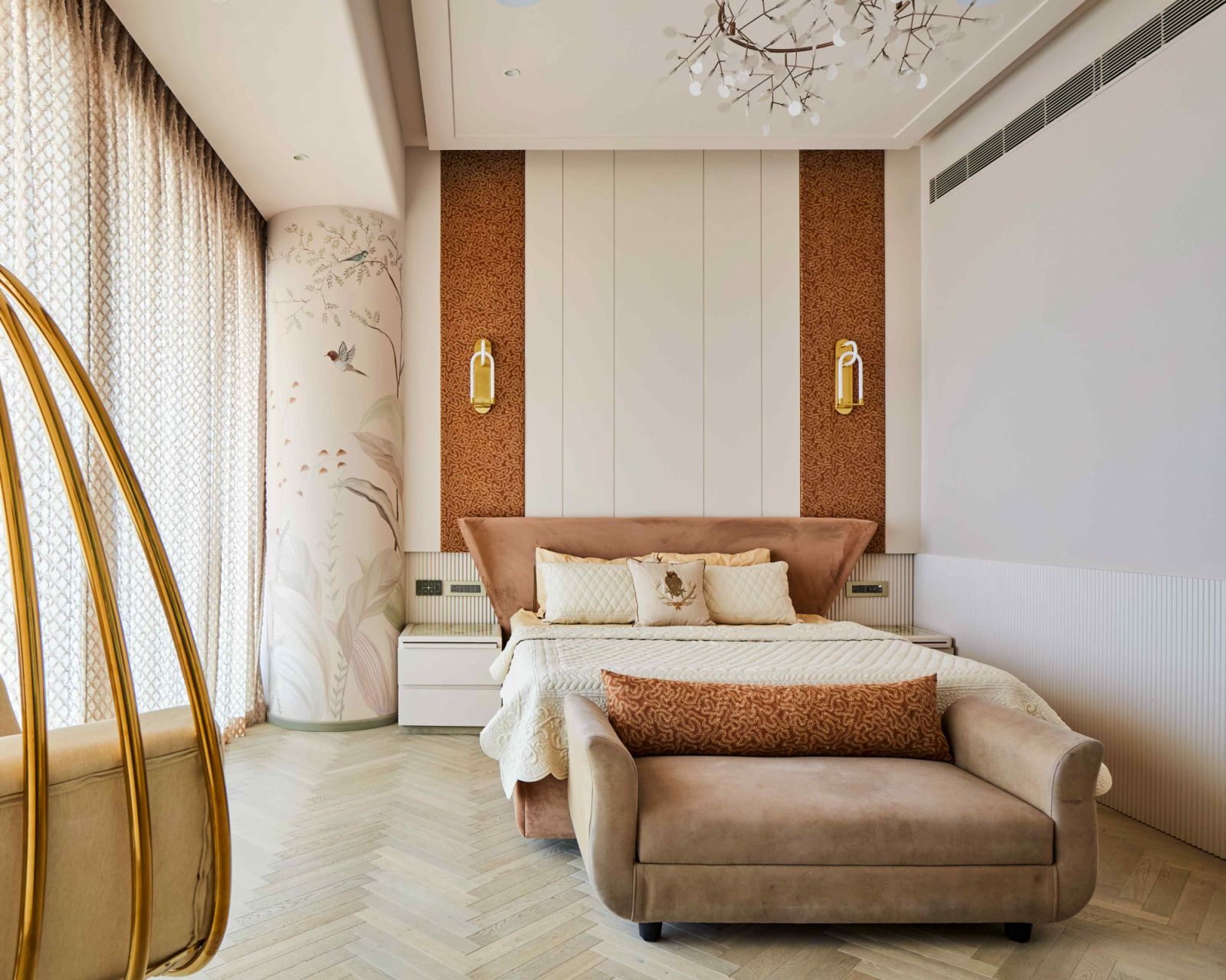 The master bedroom reflects feminine grace with a hand painted mural on a curved column